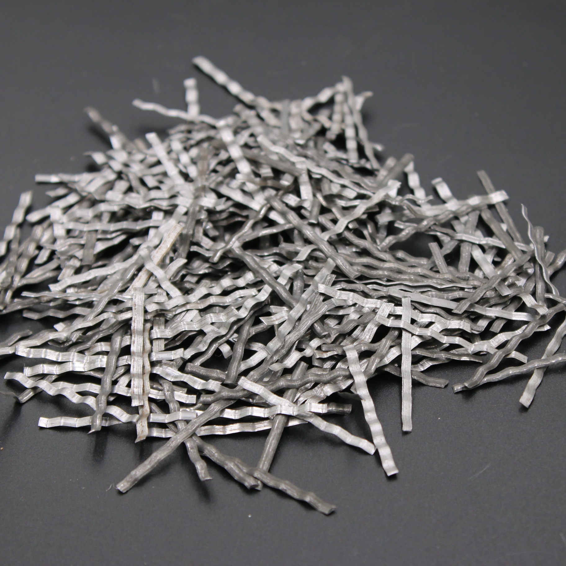 德州振邦获得一种用于钢纤维出产的多轮校直机专利进步设备运用的质量